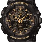 CASIO G-SHOCK WRISTWATCH / GOLDTONE AND BLACK COLOR