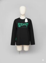 black long-sleeved shirt with a distinctive graphic print.
