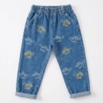 Primark blue jean with dinosaur character